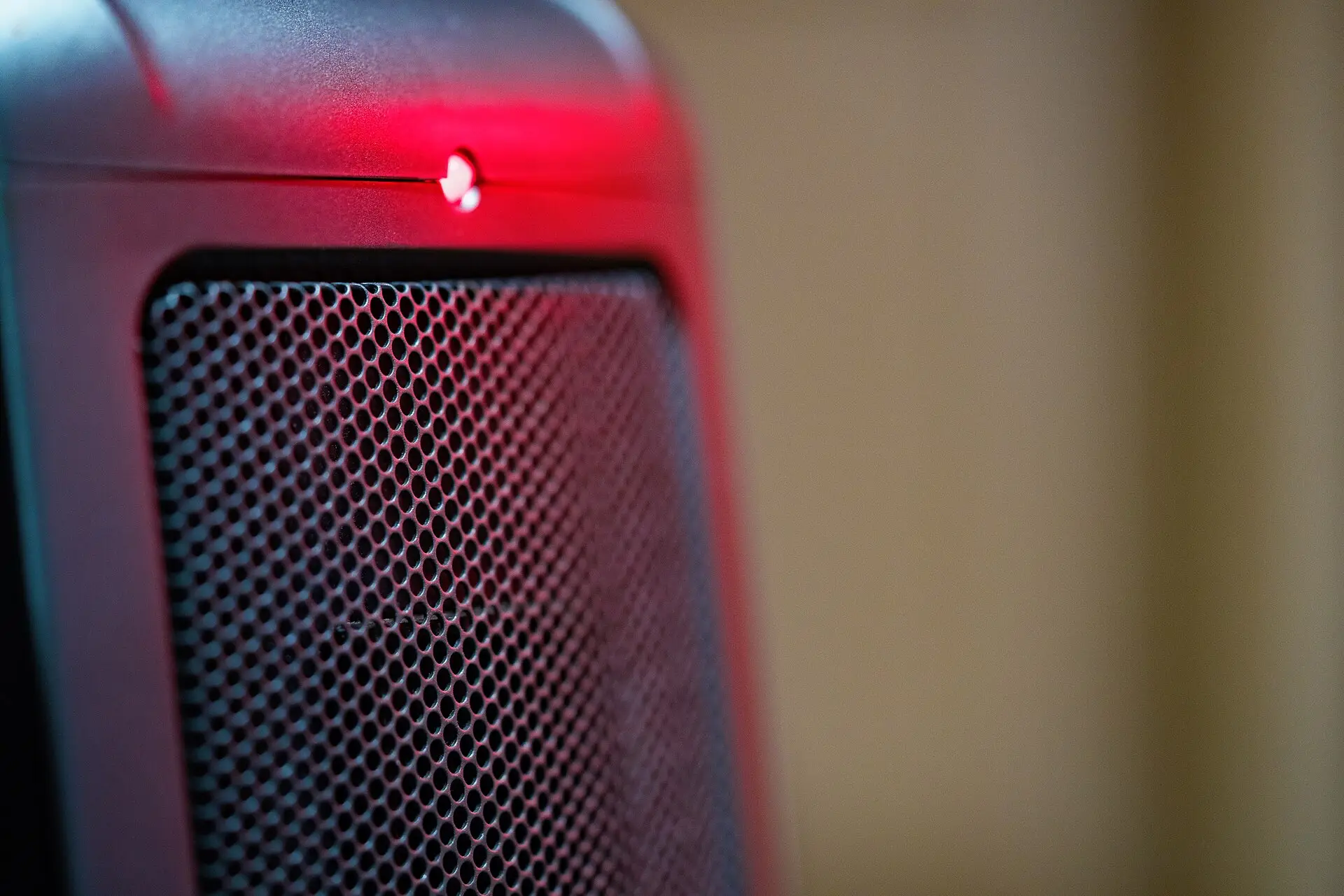 Close-up of a small ceramic space heater glowing red