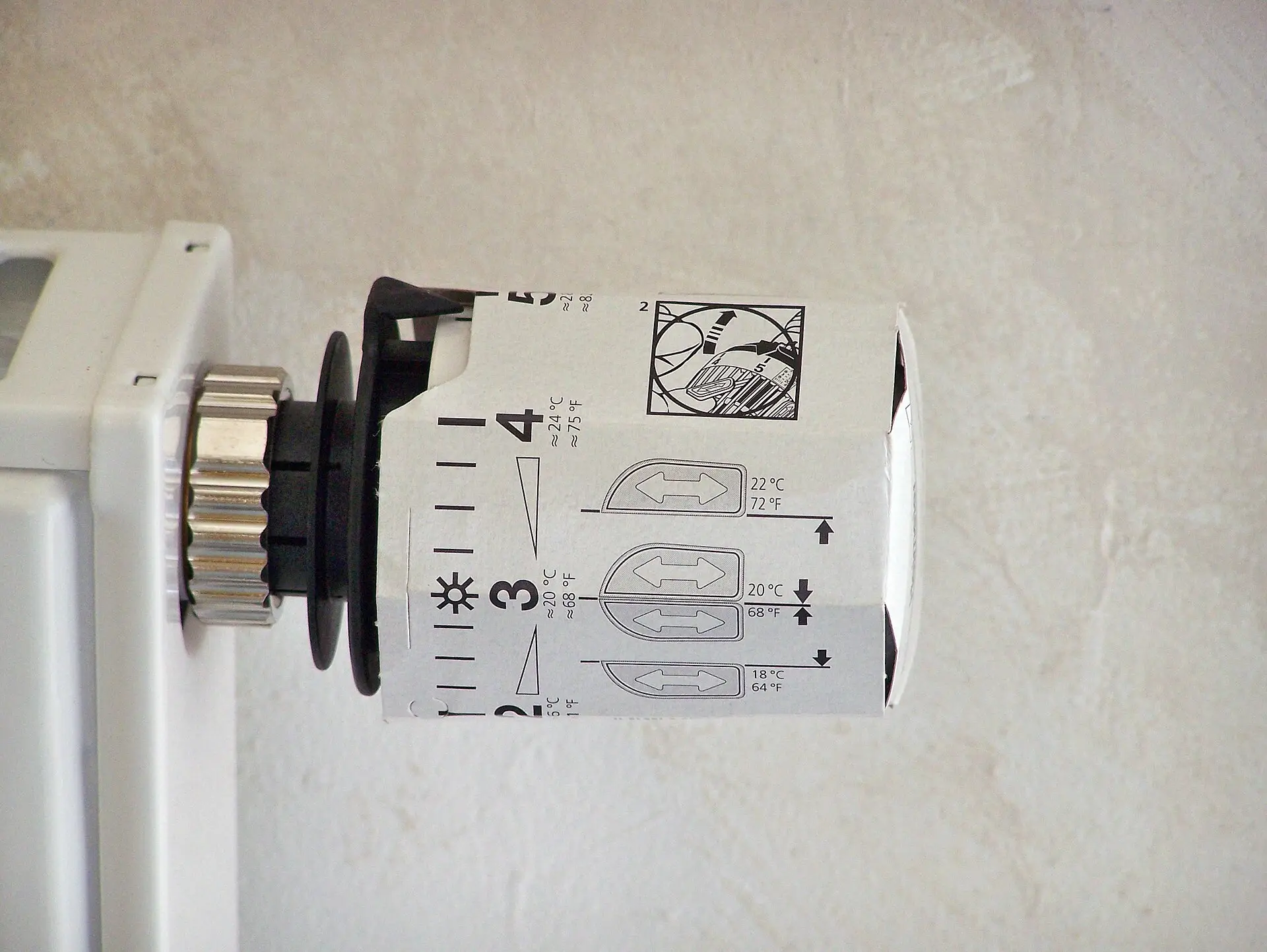 A thermostatic radiator valve with numbered settings
